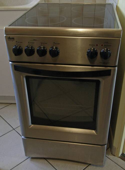 FOUR + PLAQUE VITRO Faure (garantie août 2013!!)